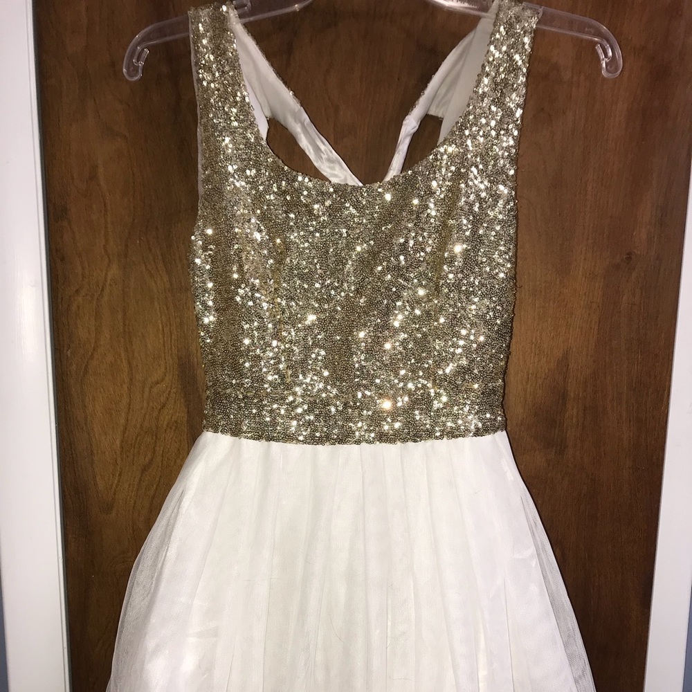 White and gold mini dress